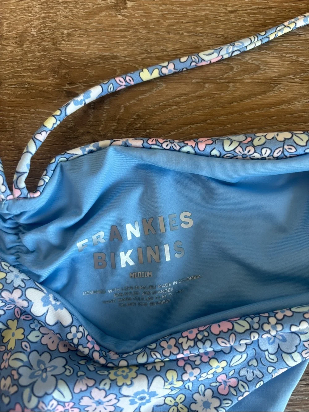 Frankie’s Bikinis blue floral bikini top and medium bottom